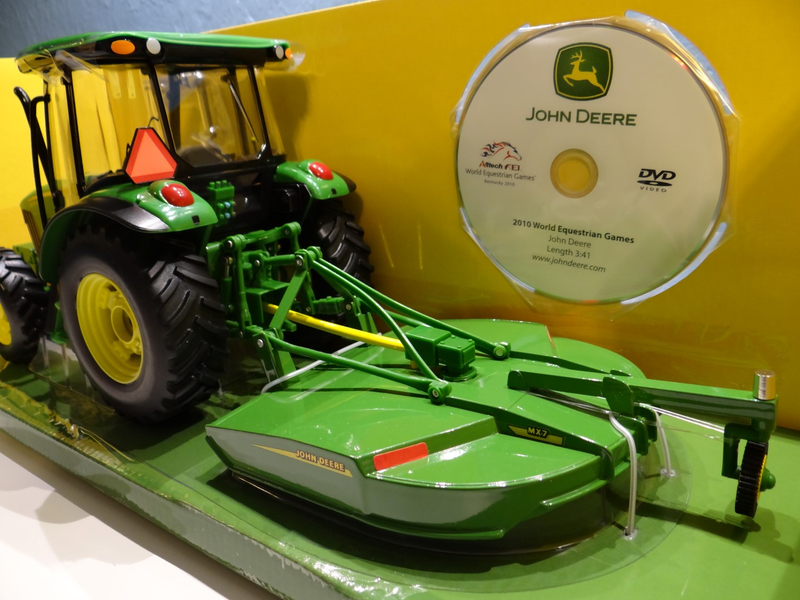 Illustration for article titled Tractor Thursday 1:16 ERTL John Deere 5095M w/ Mower